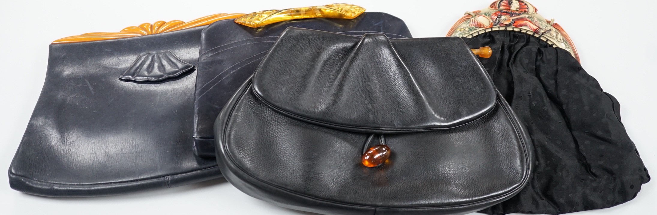 A 1930's Pierrot bakelite bag frame, together with three 1930's yellow bakelite and leather clutch bags (4)